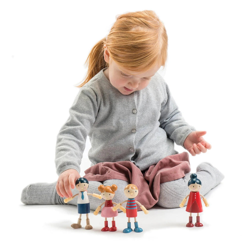 Wooden doll family set included in the Dovetail House Bundle, featuring four colorful, poseable dolls with charming painted details.